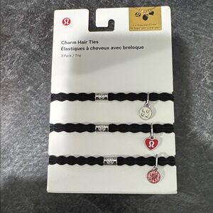 Lululemon hair ties 3 pack with Lulu charms NWT